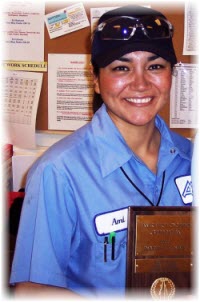 An Aircare Colordao Employee smiling and wearing a hat and uniform